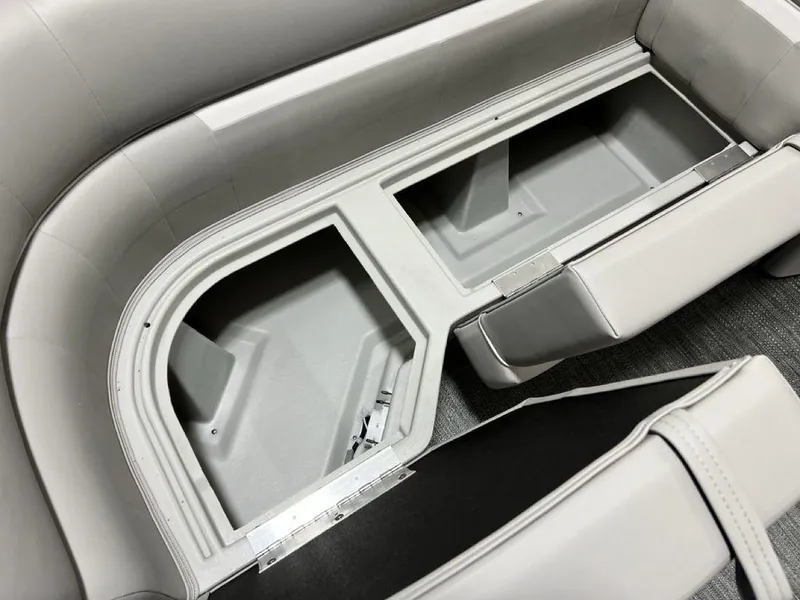 Slide: The Image of 2025 Godfrey Xperience 2086 CX boat storage compartments with open seating area. - 4
