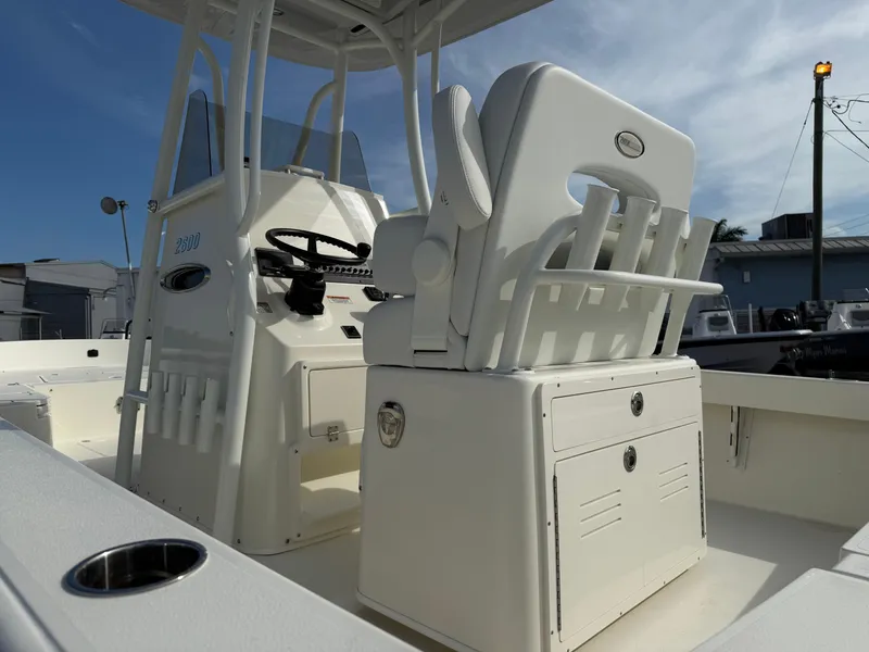 Slide: The Image of 2025 Pathfinder 2600 TRS boat interior with helm and seating, showcasing modern design. - 5