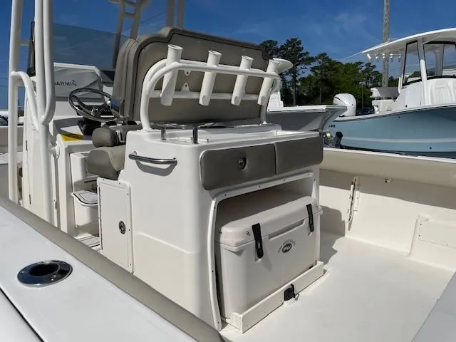 Slide: The Image of 2021 Key West 239 FS boat interior with seating and storage features. - 6