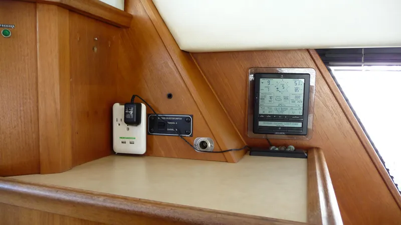 Slide: The Image of 1995 Bayliner 4788 Pilot House Motoryacht interior dashboard with navigation equipment. - 18