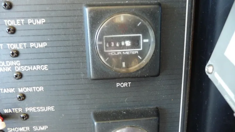 Slide: The Image of Hour meter on 1995 Bayliner 4788 Pilot House Motoryacht dashboard, showing 4366.2 hours. - 27