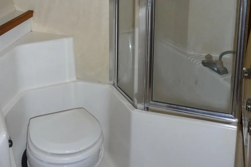 Slide: The Image of Bathroom in 1995 Bayliner 4788 Pilot House Motoryacht with shower and toilet. - 36