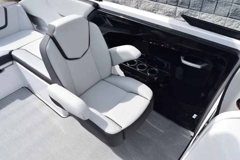 Slide: The Image of 2025 Yamaha Boats AR250 interior with sleek seating and modern design. - 10