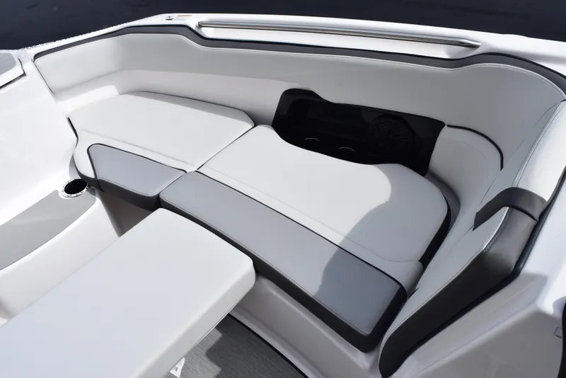 Slide: The Image of 2025 Yamaha Boats AR250 interior seating with sleek, modern design and comfortable upholstery. - 16