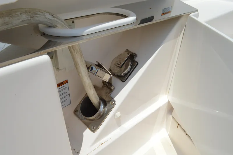 Slide: The Image of Fuel inlet and hose on a 2019 Tiara Yachts C39 Coupe. - 24