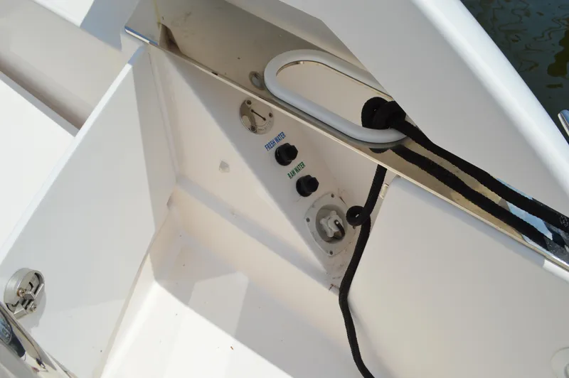Slide: The Image of 2019 Tiara Yachts C39 Coupe deck area with utility connections and rope. - 25