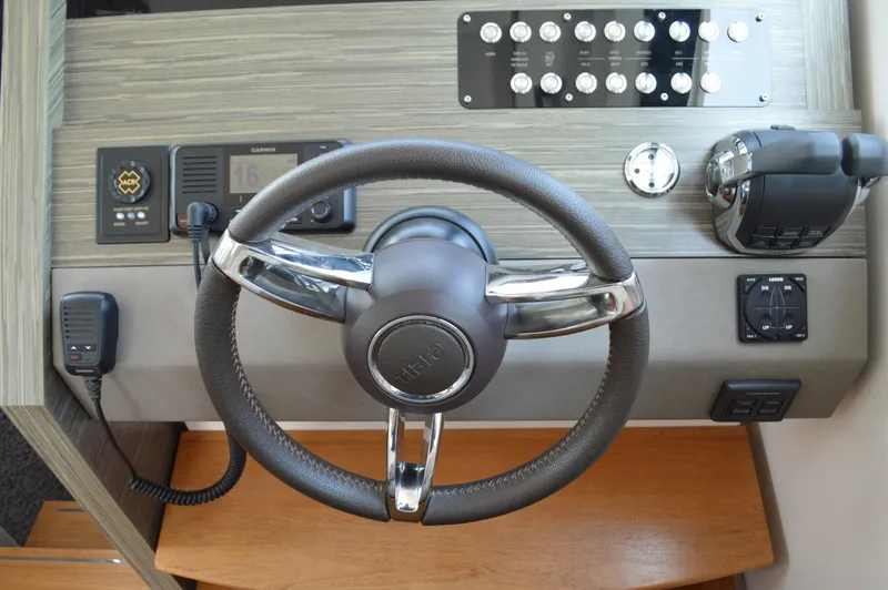 Slide: The Image of Steering wheel and controls of 2019 Tiara Yachts C39 Coupe. - 39