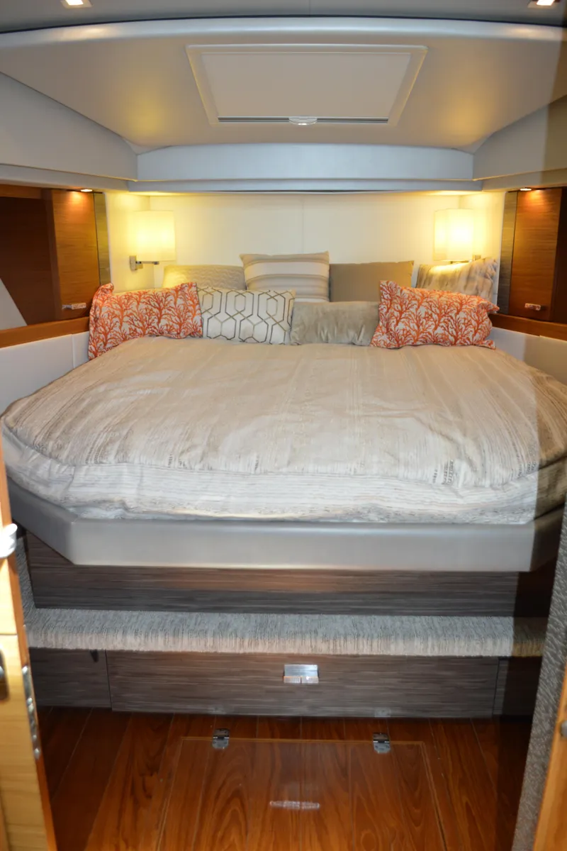 Slide: The Image of Luxurious bedroom interior of 2019 Tiara Yachts C39 Coupe with elegant bedding and ambient lighting. - 43