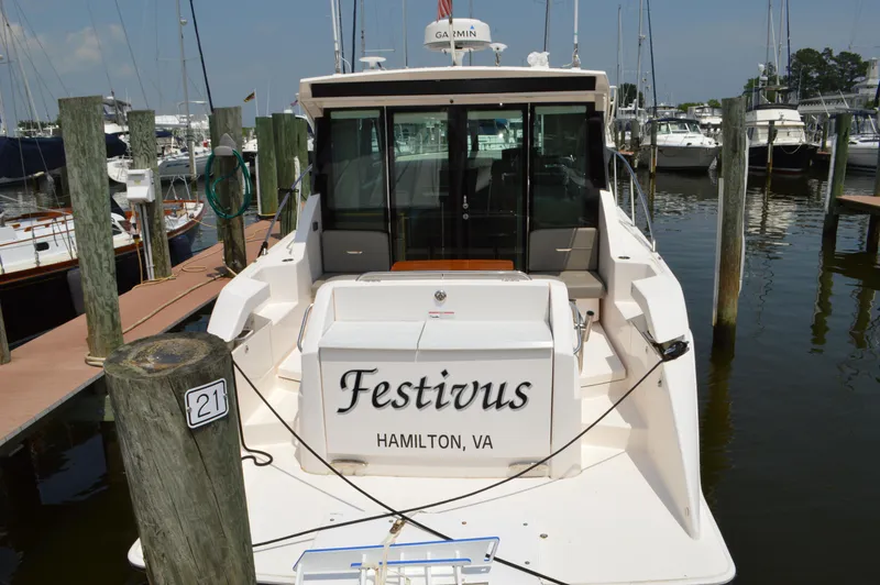 Slide: The Image of 2019 Tiara Yachts C39 Coupe named Festivus docked in a marina, Hamilton, VA. - 8