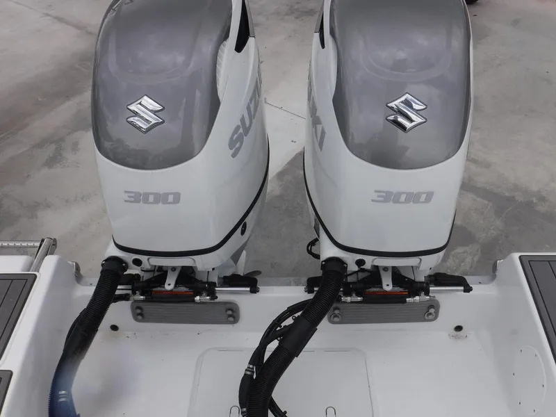 Slide: The Image of Twin Suzuki 300 outboard engines on 2025 NauticStar 292 Legacy boat. - 22