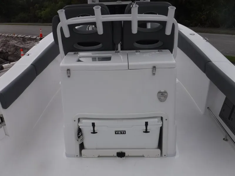 Slide: The Image of 2025 NauticStar 292 Legacy boat interior with Yeti cooler and seating. - 30