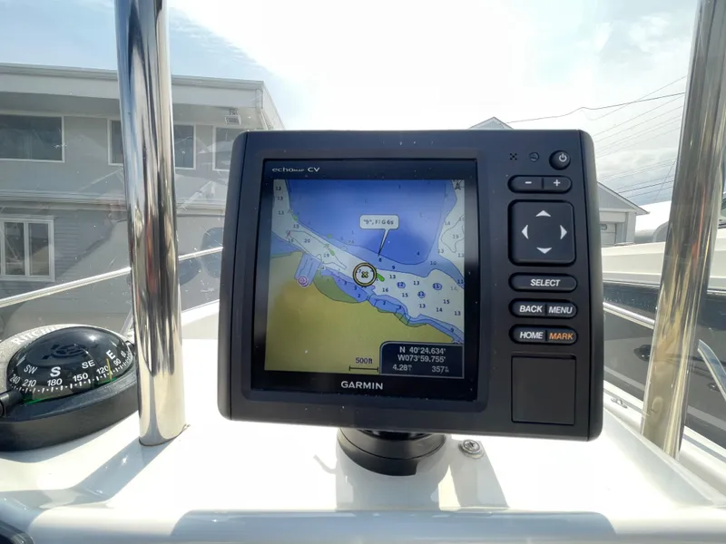 Slide: The Image of Garmin GPS on 1999 Boston Whaler 16 Dauntless boat, displaying nautical map. - 11