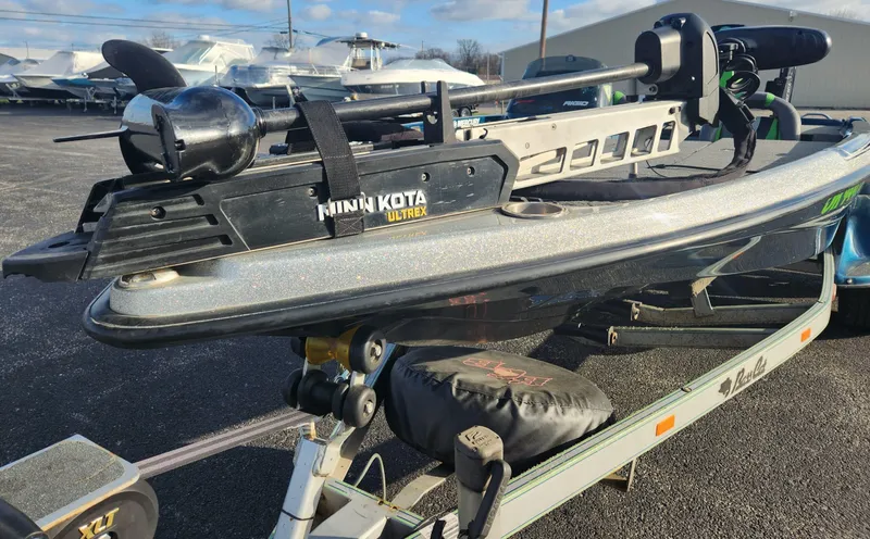 Slide: The Image of 2014 Bass Cat Eyra boat with Minn Kota Ultrex trolling motor on trailer. - 29