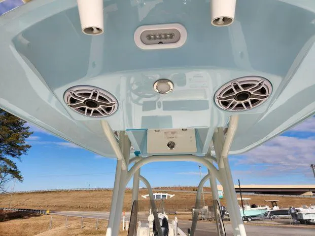 Slide: The Image of 2024 Pathfinder 2700 Open boat with speakers and lights on the canopy. - 16