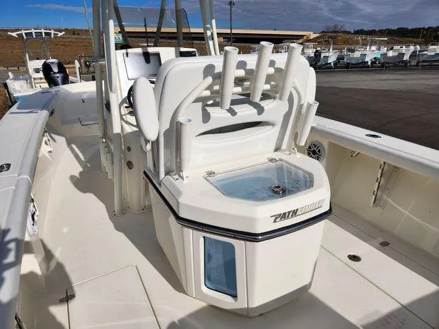Slide: The Image of 2024 Pathfinder 2700 Open boat with rod holders and livewell on deck. - 18
