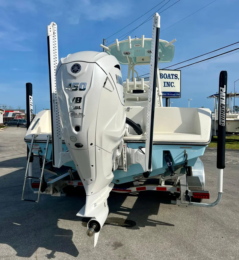 Slide: The Image of 2024 Pathfinder 2700 Open boat with Yamaha 450 engine, displayed outdoors. - 29