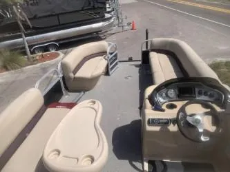 Slide: The Image of 2017 Sun Tracker Party Barge 24 DLX pontoon boat with spacious seating and helm. - 3