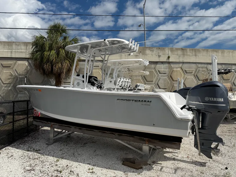 The Image of 2020 Sportsman Open 232 Center Console boat with Yamaha engine, parked outdoors. - 0