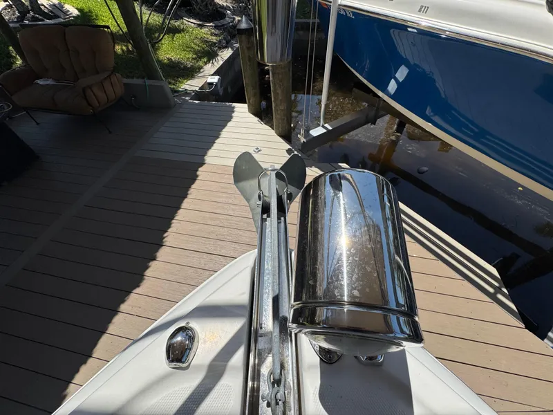 Slide: The Image of 2009 Chaparral Signature 290 boat anchor and deck detail in marina setting. - 27