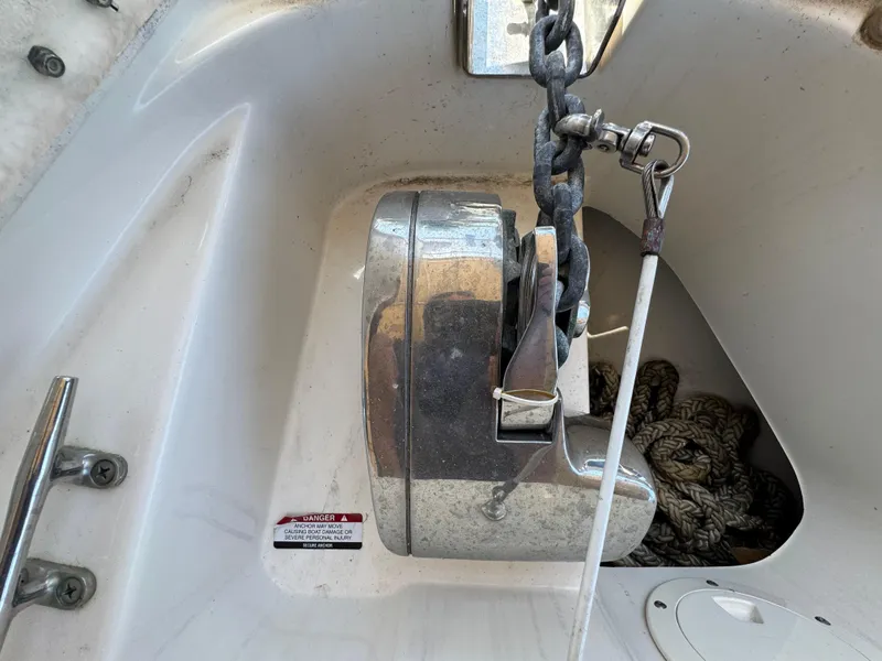 Slide: The Image of 2009 Chaparral Signature 290 anchor windlass with chain and rope storage. - 28