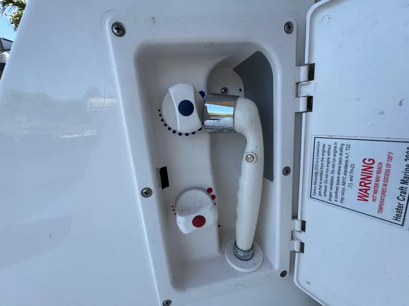 Slide: The Image of Exterior shower controls on a 2009 Chaparral Signature 290 boat. - 29