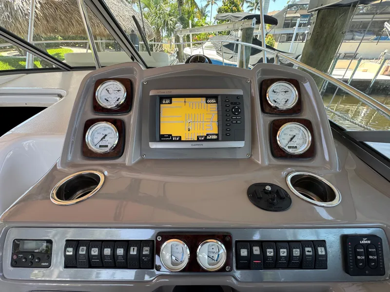 Slide: The Image of 2009 Chaparral Signature 290 dashboard with navigation system and gauges. - 7
