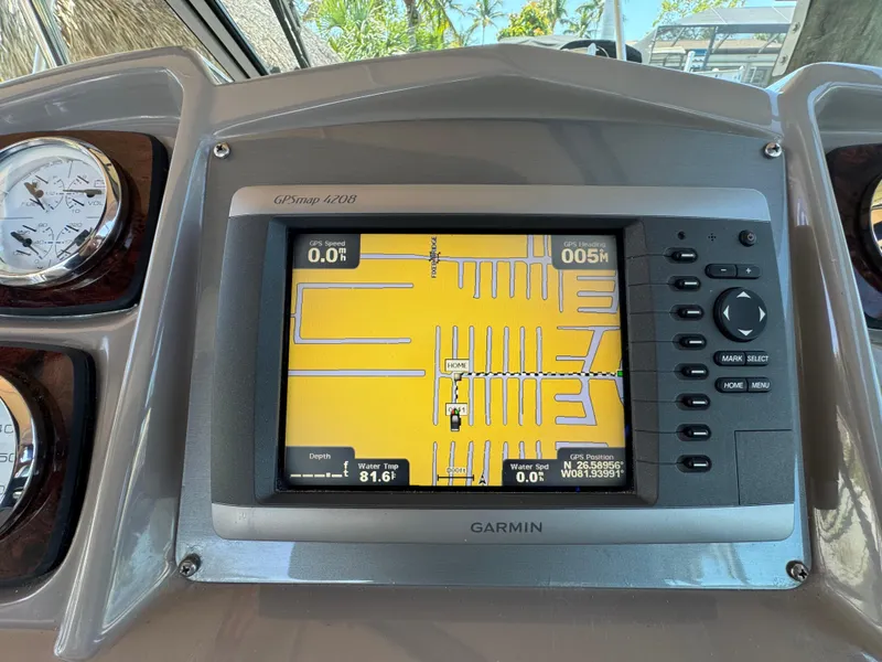 Slide: The Image of Garmin GPS display on 2009 Chaparral Signature 290 boat dashboard, showing navigation map. - 8