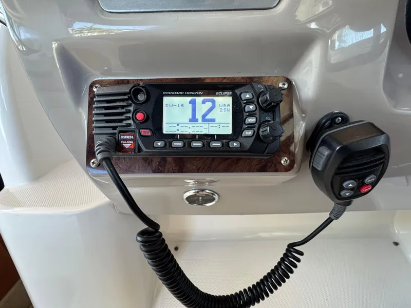 Slide: The Image of VHF radio system on 2009 Chaparral Signature 290 boat dashboard. - 9
