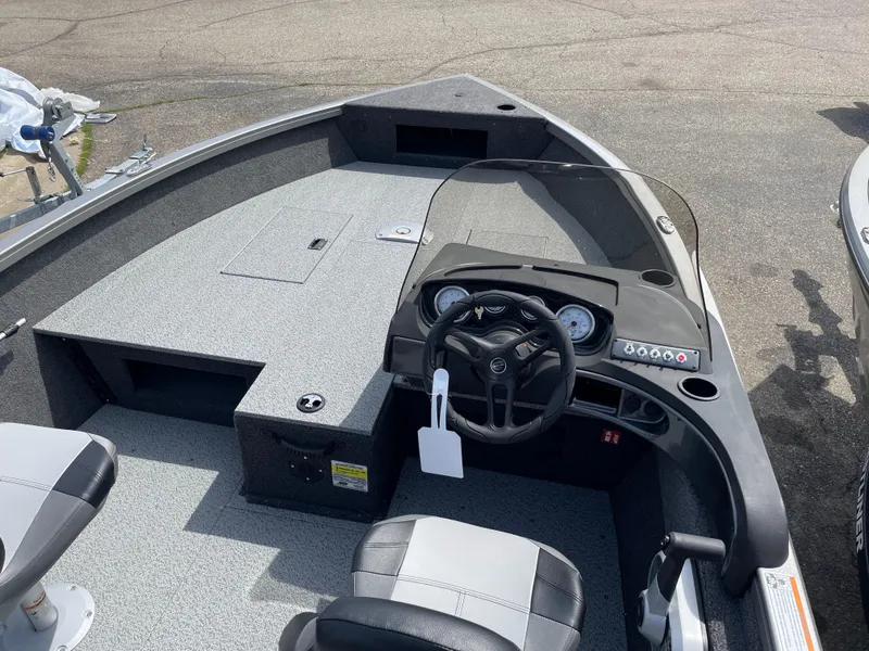 Slide: The Image of 2025 Crestliner 1750 Hawk SC boat interior with steering console and seating. - 10