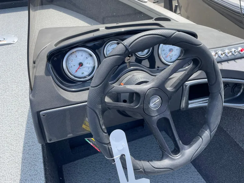 Slide: The Image of Steering wheel and dashboard of 2025 Crestliner 1750 Hawk SC boat. - 12