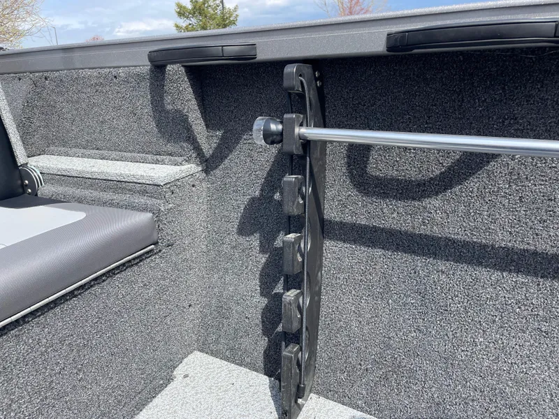 Slide: The Image of 2025 Crestliner 1750 Hawk SC interior with rod holder and seating detail. - 7