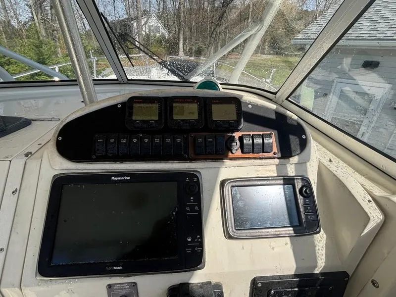 Slide: The Image of Control panel of a 2001 World Cat 266 SC boat with navigation equipment. - 5