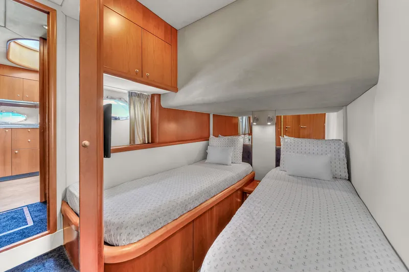 Slide: The Image of Twin cabin interior of 2006 Sunseeker Predator 72 yacht with wooden finishes. - 40