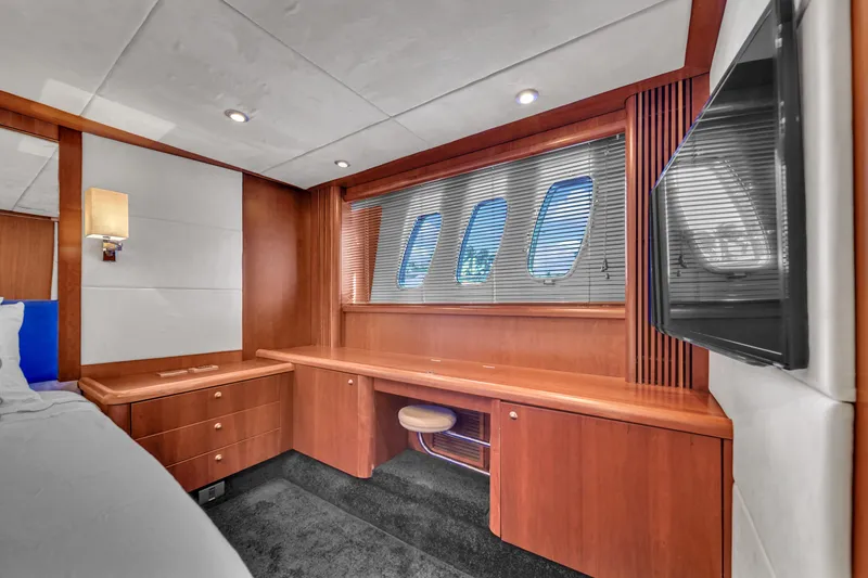 Slide: The Image of Luxurious cabin interior of 2006 Sunseeker Predator 72 yacht with wood furnishings. - 48