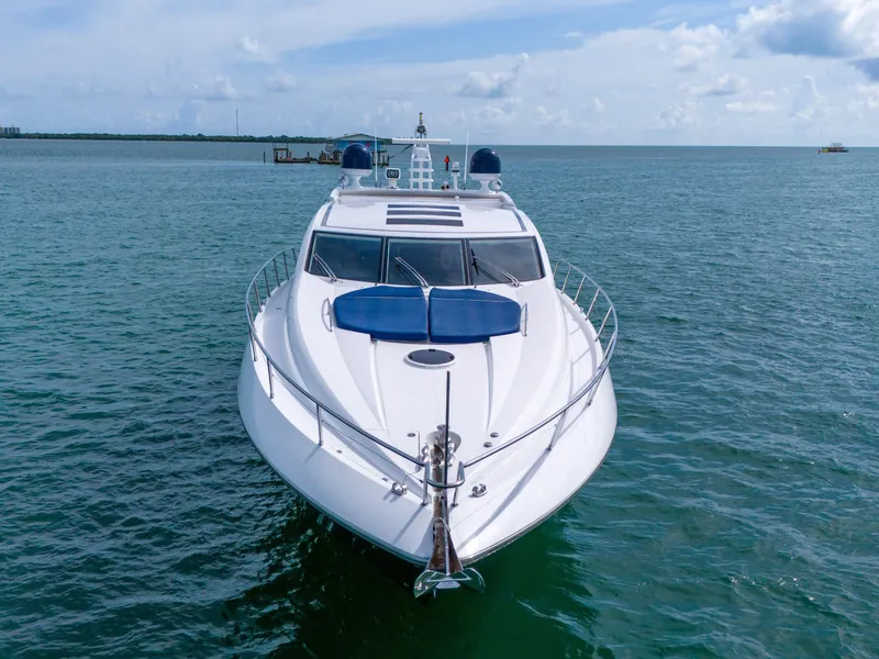 Slide: The Image of 2006 Sunseeker Predator 72 yacht on open water, front view. - 6