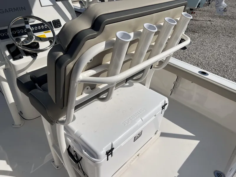 Slide: The Image of 2025 Key West 250 Bay Reef boat interior with rod holders and cooler. - 16