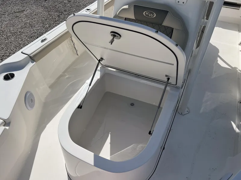 Slide: The Image of Open storage compartment on 2025 Key West 250 Bay Reef boat. - 27