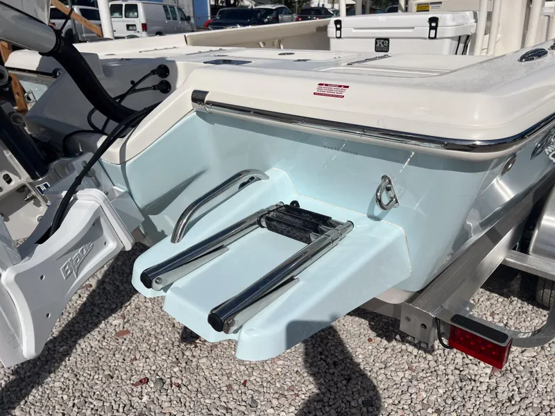 Slide: The Image of 2025 Key West 250 Bay Reef boat with swim platform and ladder. - 9