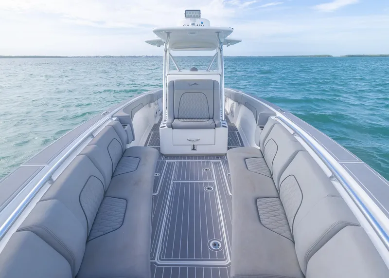 Slide: The Image of 2021 Blackwater 36 Sport boat with spacious seating on open water. - 6