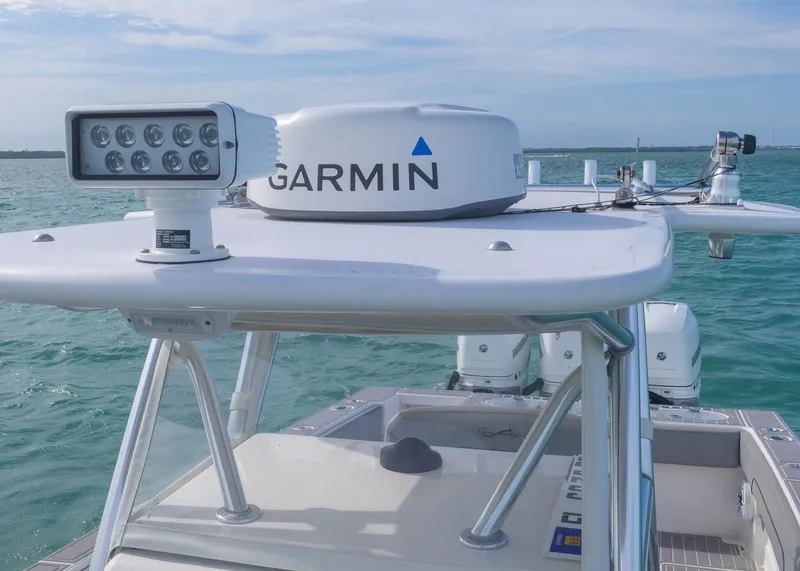 Slide: The Image of 2021 Blackwater 36 Sport boat with Garmin radar on open water. - 8