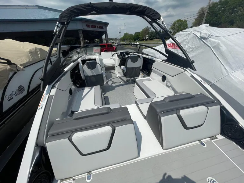 Slide: The Image of 2025 Yamaha Boats AR250 interior with sleek seating and modern design. - 6