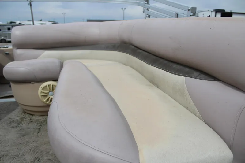 Slide: The Image of 2014 Sun Tracker Bass Buggy 18 DLX boat seating with beige upholstery. - 12