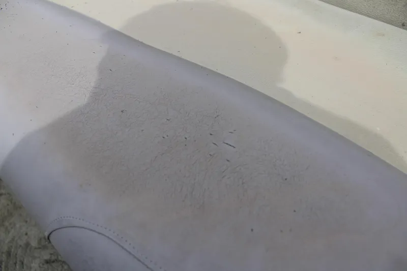 Slide: The Image of Worn seat upholstery on 2014 Sun Tracker Bass Buggy 18 DLX boat. - 13