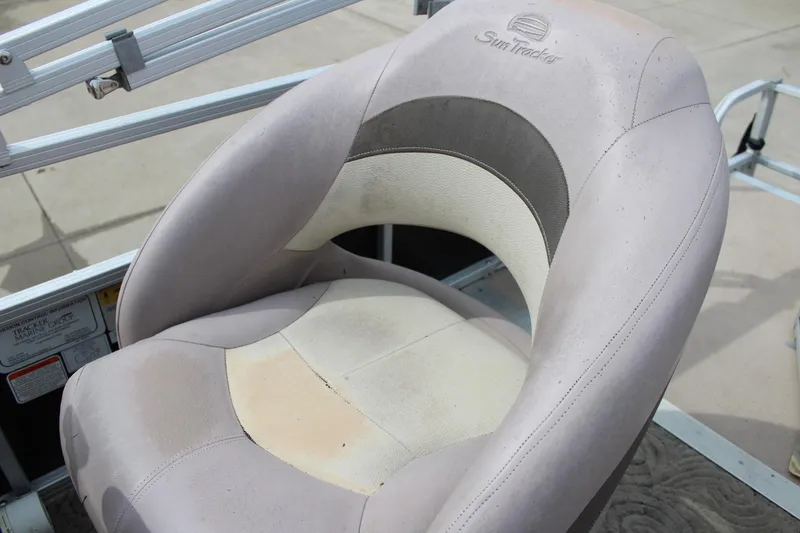 Slide: The Image of 2014 Sun Tracker Bass Buggy 18 DLX boat seat, beige and gray upholstery. - 16