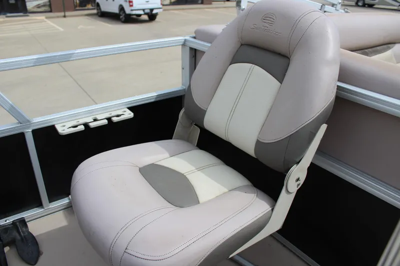 Slide: The Image of 2014 Sun Tracker Bass Buggy 18 DLX boat seat, beige and gray upholstery. - 21