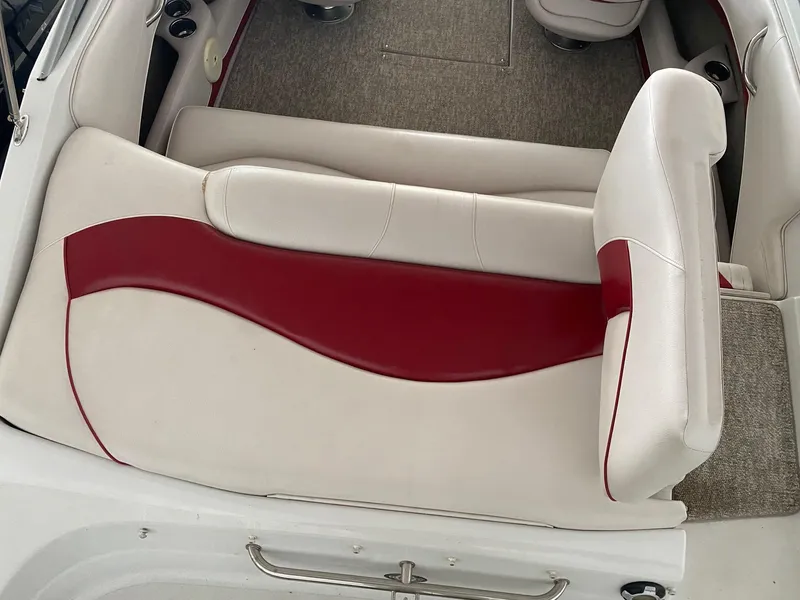 Slide: The Image of 2012 Crownline 21 SS boat interior with red and white seating. - 3