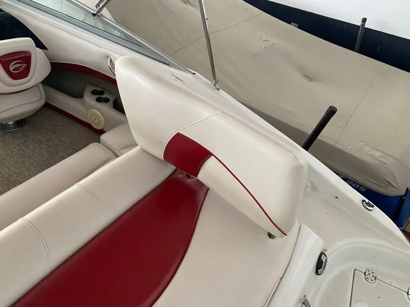 Slide: The Image of 2012 Crownline 21 SS boat interior with red and white seating. - 4