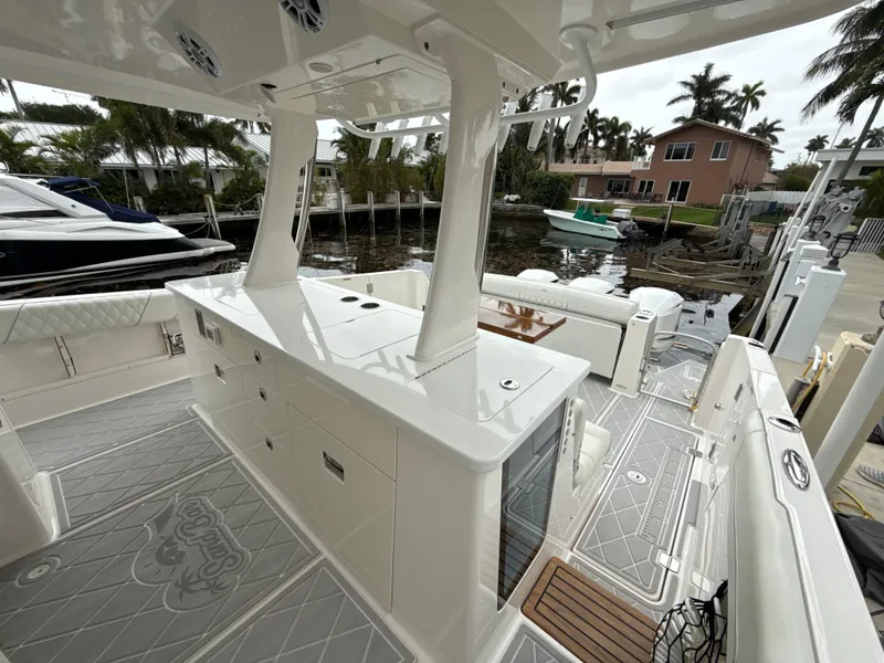 Slide: The Image of 2021 Regal 38 SAV boat interior with sleek design, spacious deck, and modern amenities. - 10