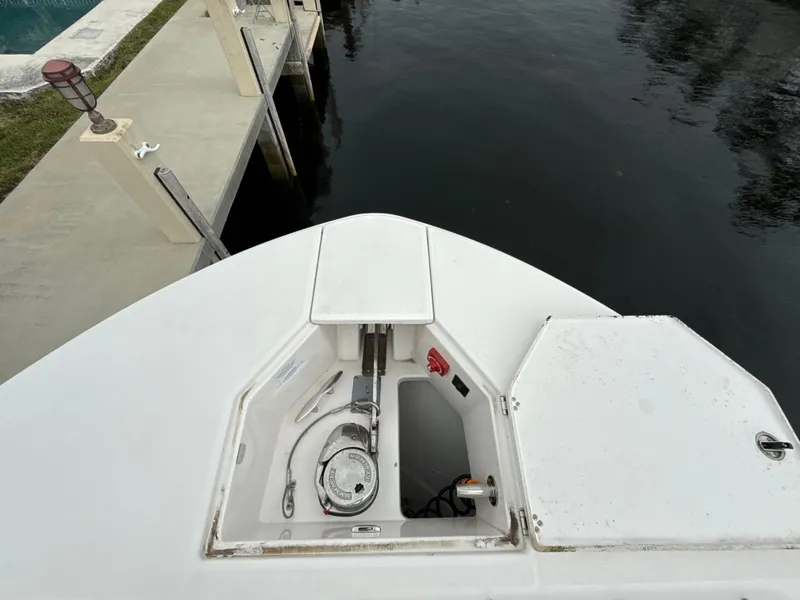 Slide: The Image of Bow of 2021 Regal 38 SAV boat with anchor compartment open. - 25