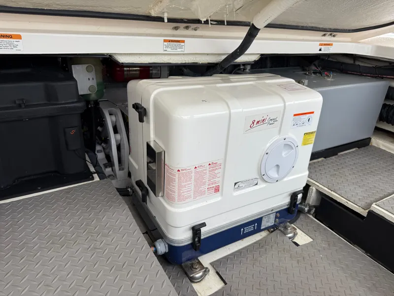Slide: The Image of Engine room of 2021 Regal 38 SAV boat with generator. - 33